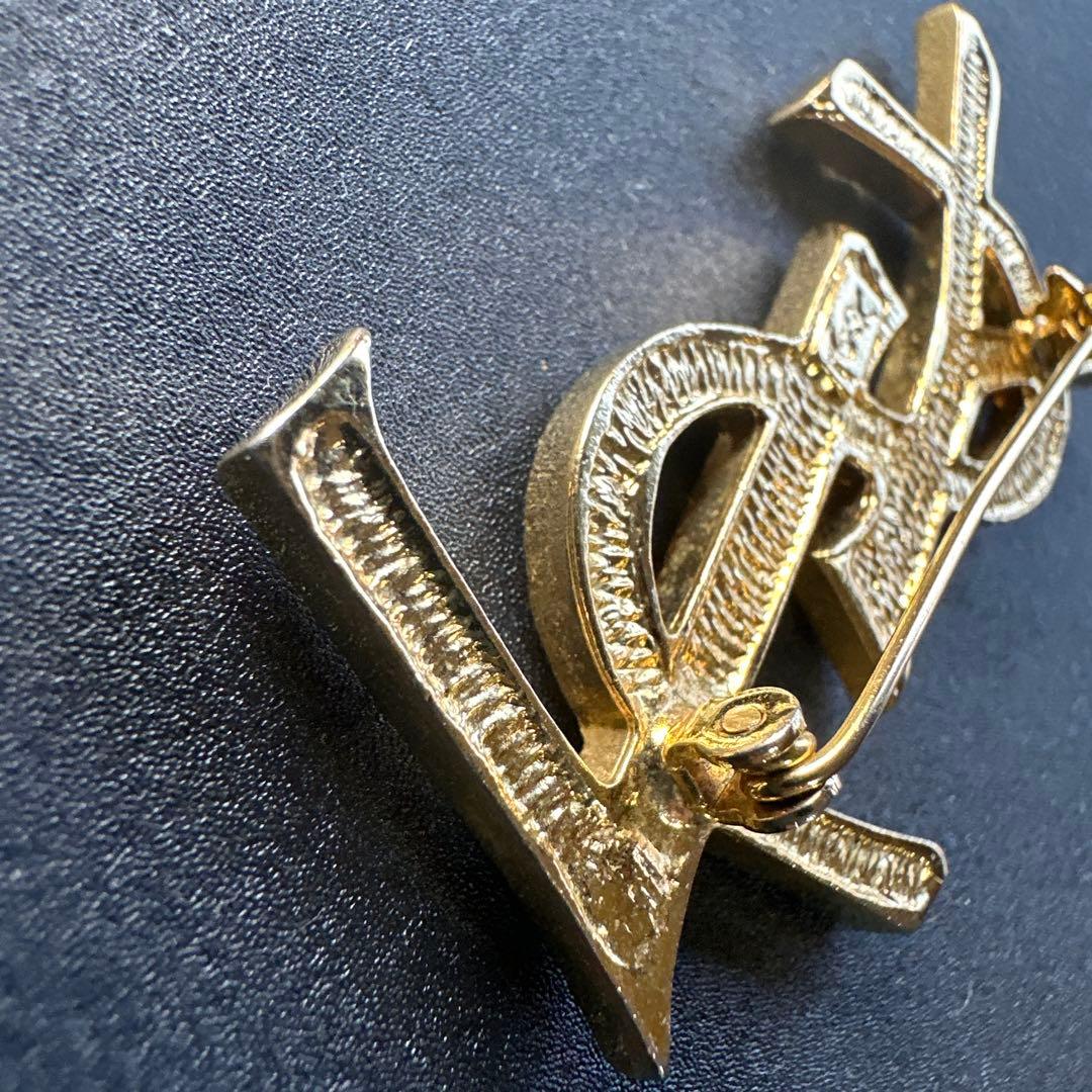 vintage】YSL ロゴブローチ ゴールドカラー イヴサンローランの通販は