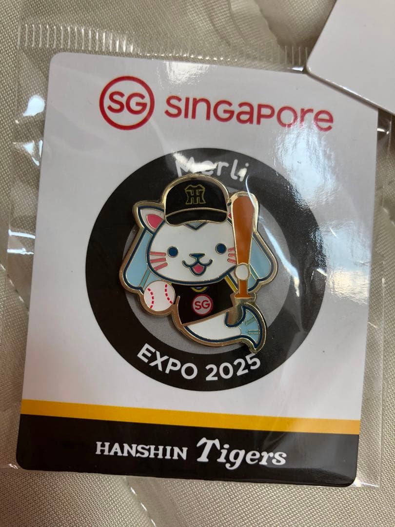 HANSHIN Tigers Merli ピンバッジ 2025 シンガポール館 - メルカリ