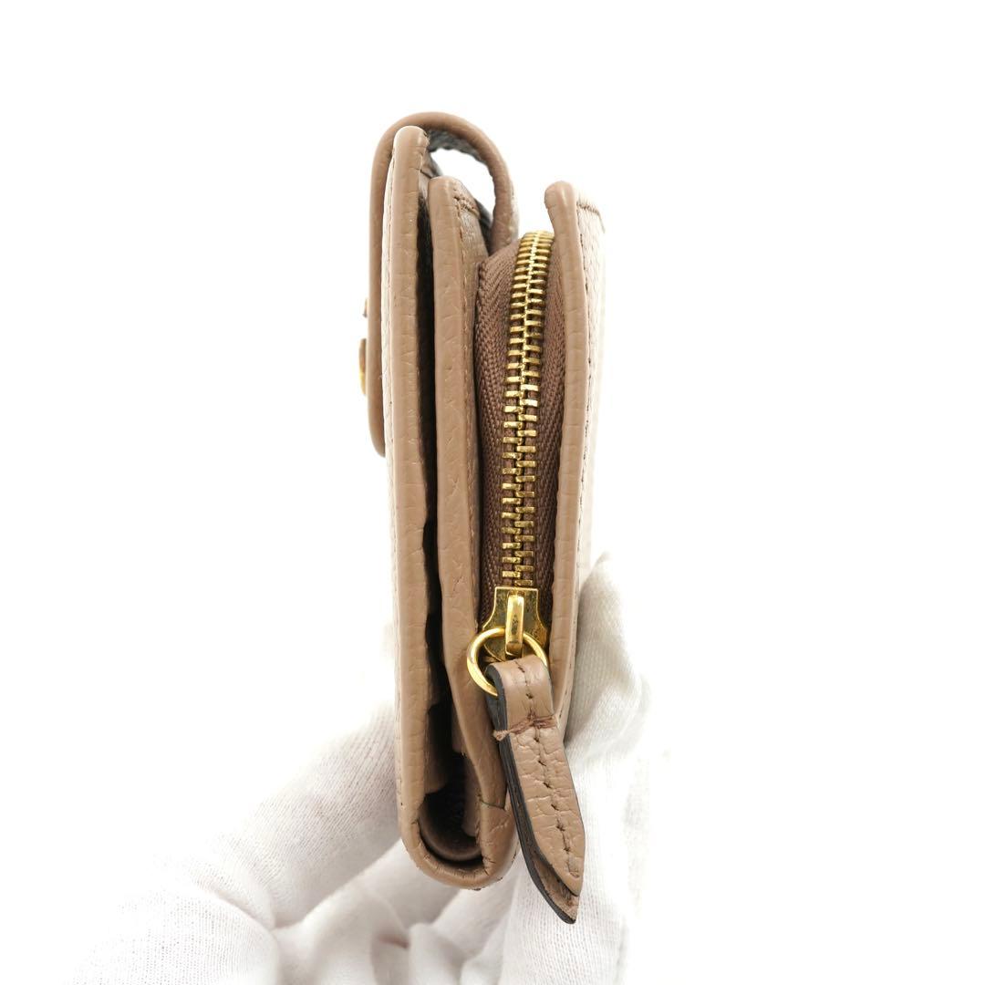 ✨未使用展示品✨　GUCCI ミニ財布　マーモント　二つ折り　エンボスロゴ　GG