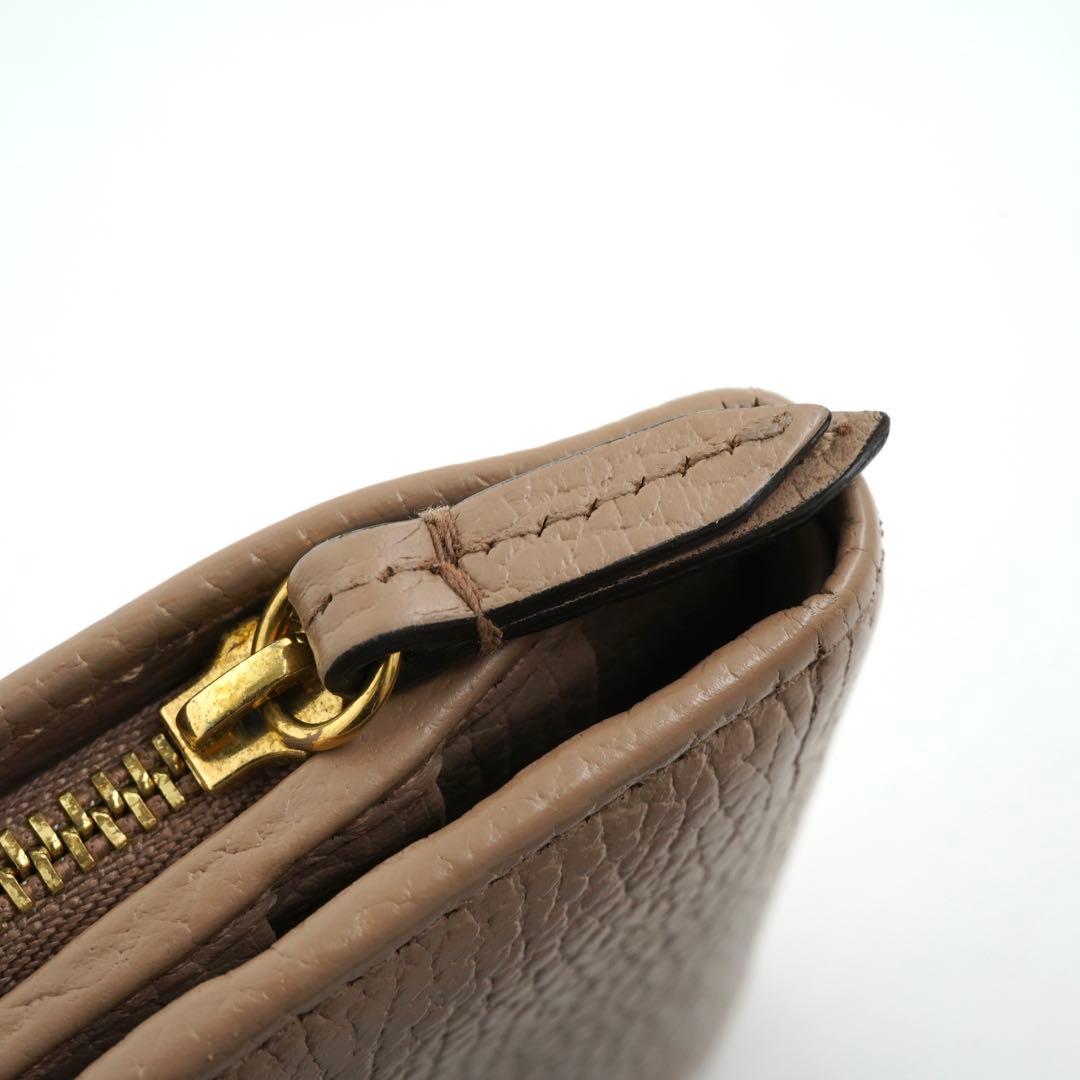 ✨未使用展示品✨　GUCCI ミニ財布　マーモント　二つ折り　エンボスロゴ　GG