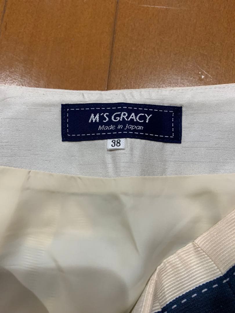 新品☆ エムズグレイシー のカメリアリボンボーダーフレアスカート