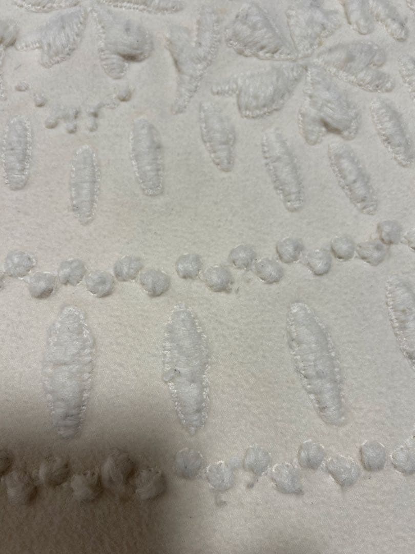 お値下げしましたエルマンノシェルビーノの円型ホワイト フレアスカート 刺繍