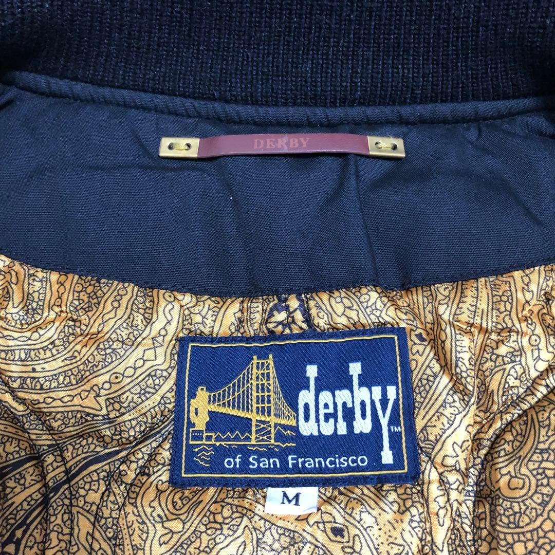 ダービーオブサンフランシスコ カップショルダージャケット 黒×金