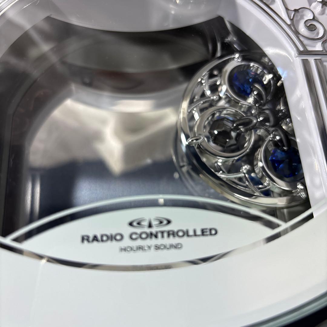 リズム掛け時計 電波時計アナログ スモールワールドプラウド 4MN523RH05