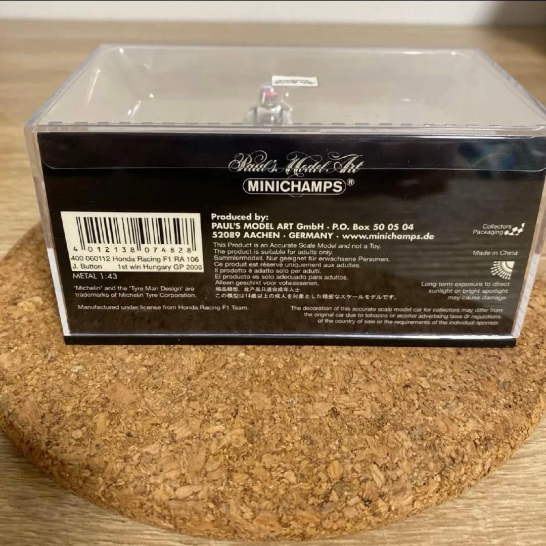 ミニチャンプスHONDARACING RA106.J.BUTTON 1 WIN