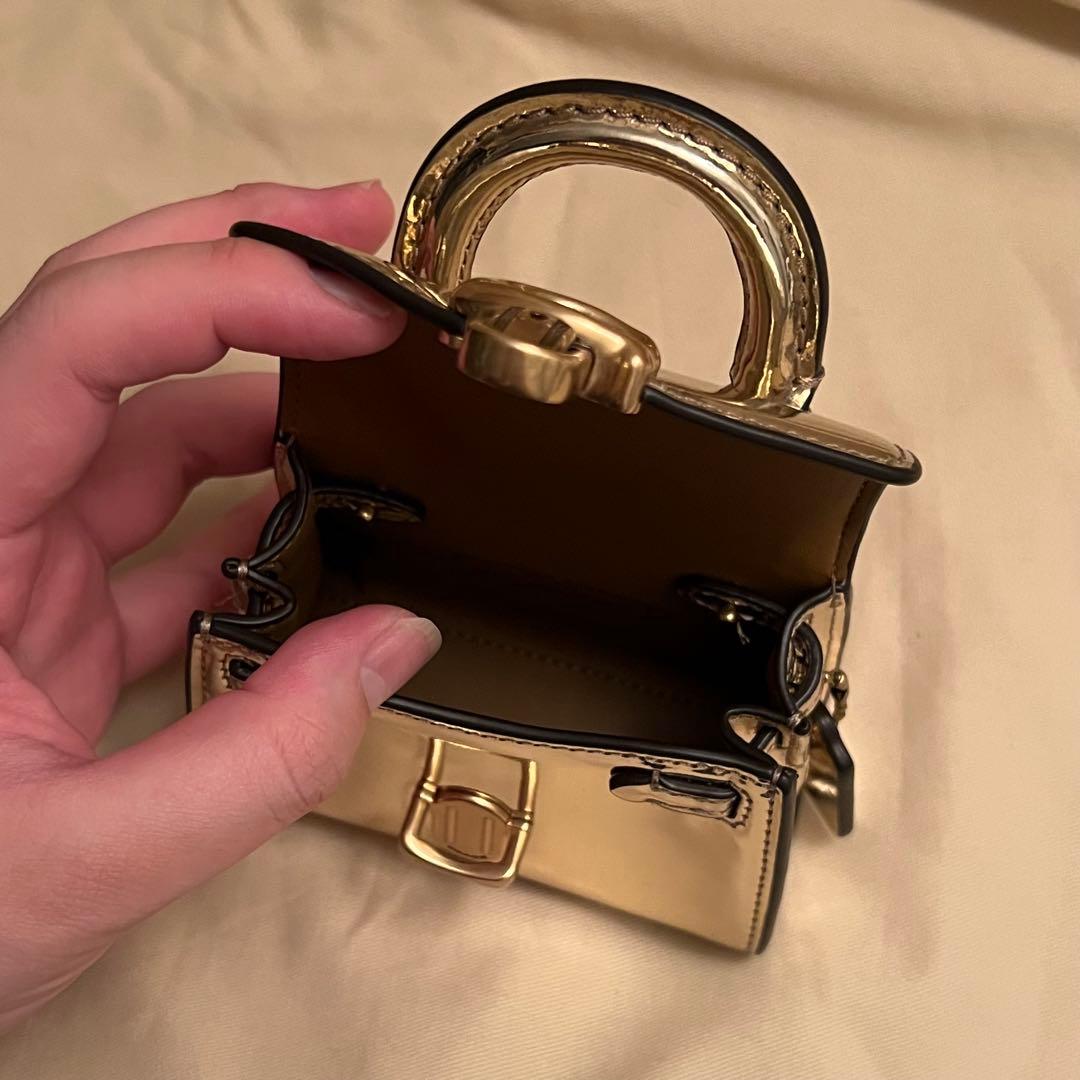 COACH ゴールド (2点)