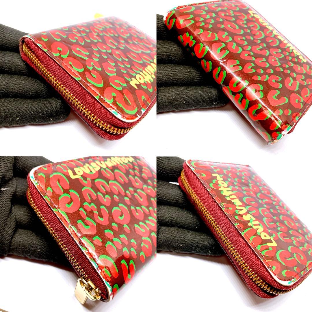 818 ルイヴィトン モノグラム　レオパード　折り財布　ジッピーパース