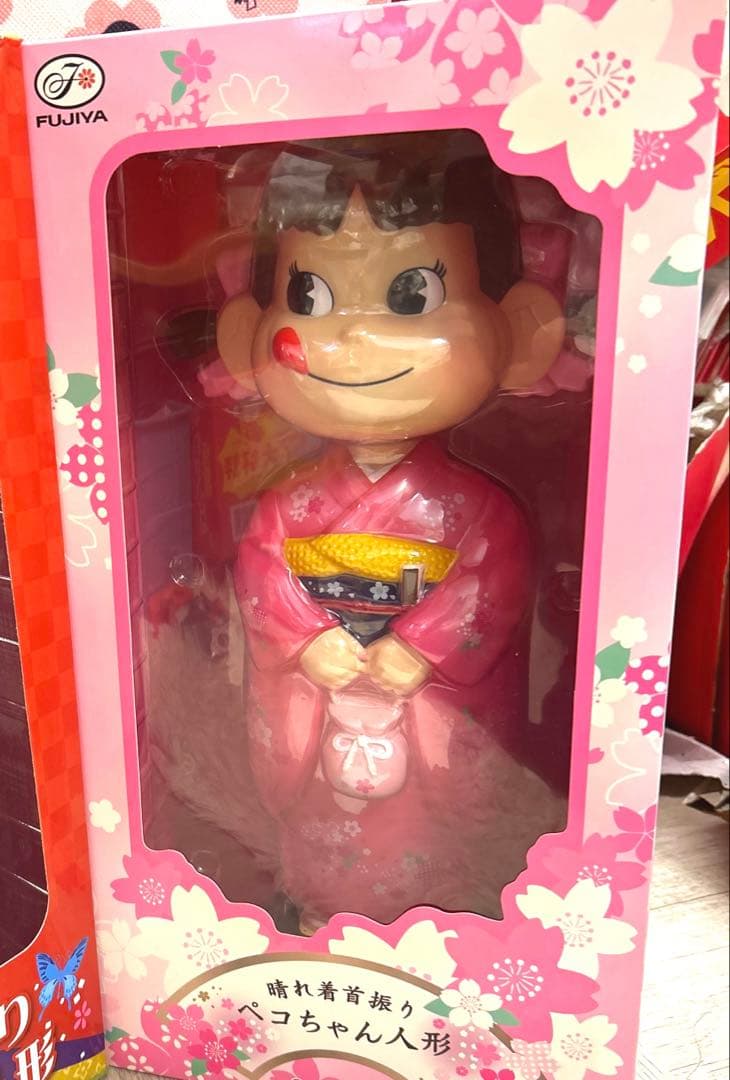 新品未開封 不二家ミルキーペコちゃん 首振り着物人形ピンク - メルカリ