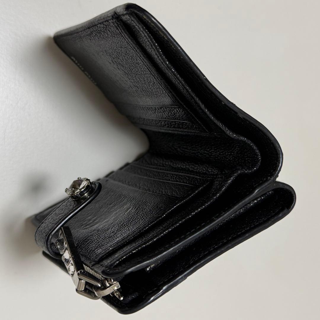 miumiu レア 二つ折り財布 ビジユーつき - メルカリ