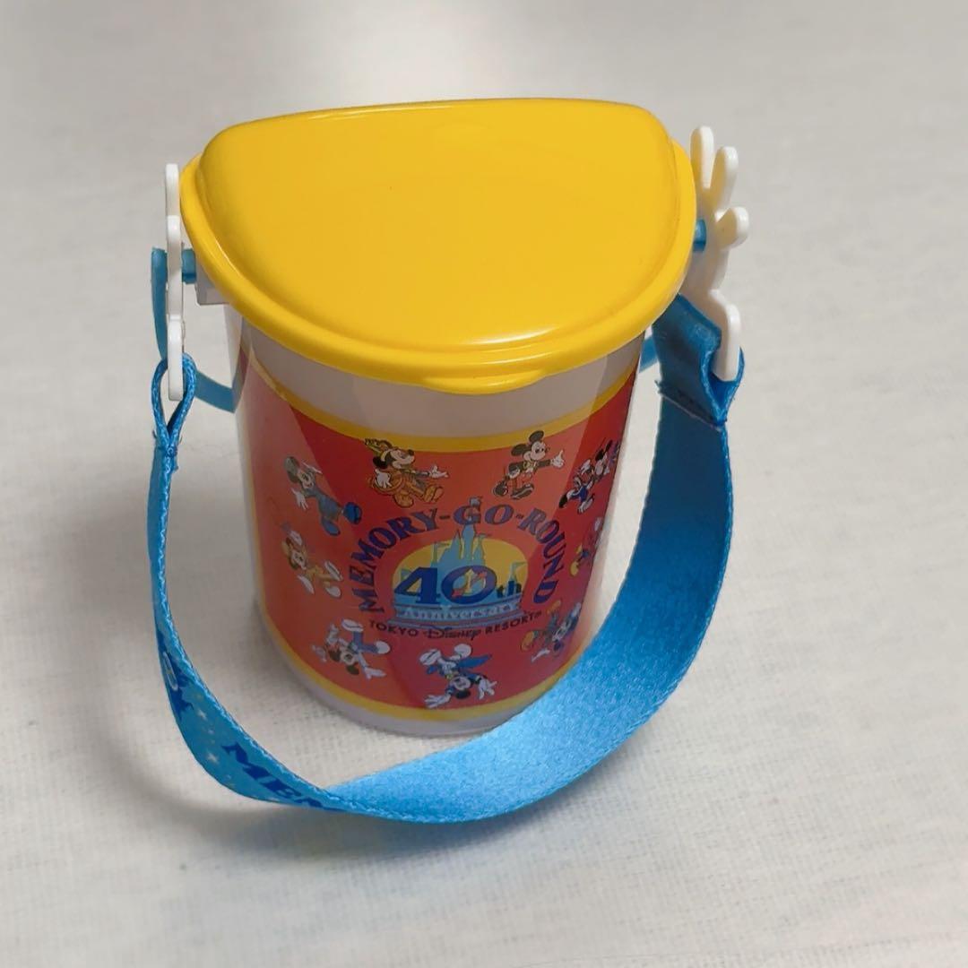 ディズニー グッズ スナックケース スーベニア 歴代 40周年 - メルカリ