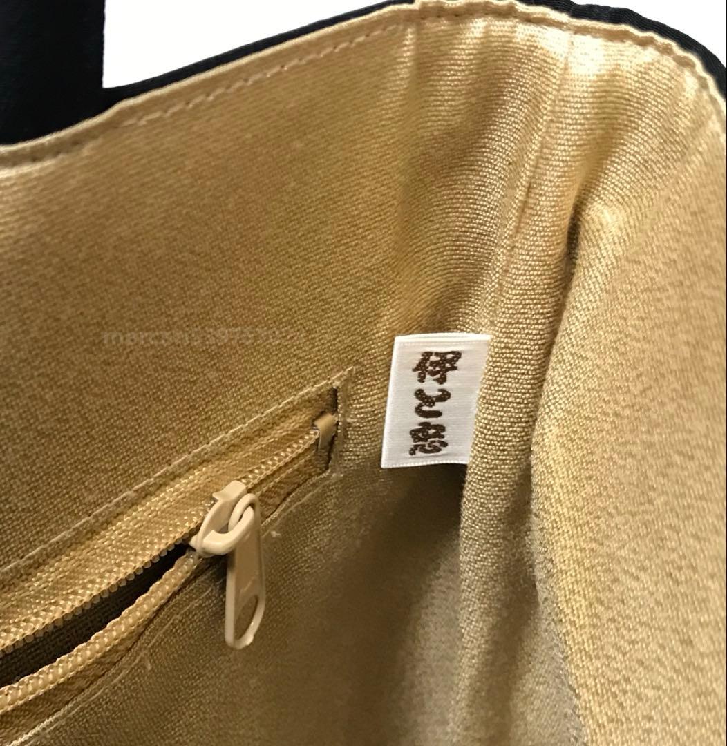 京都　伊と忠　正絹　和装　手提げバッグ（黒ちりめん　手刺繍　宝尽し）