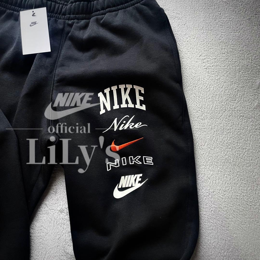 【Ｍサイズ】新品未使用　ナイキ上下セットアップ　ブラック✖︎オレンジ　黒　ロゴ刺繍