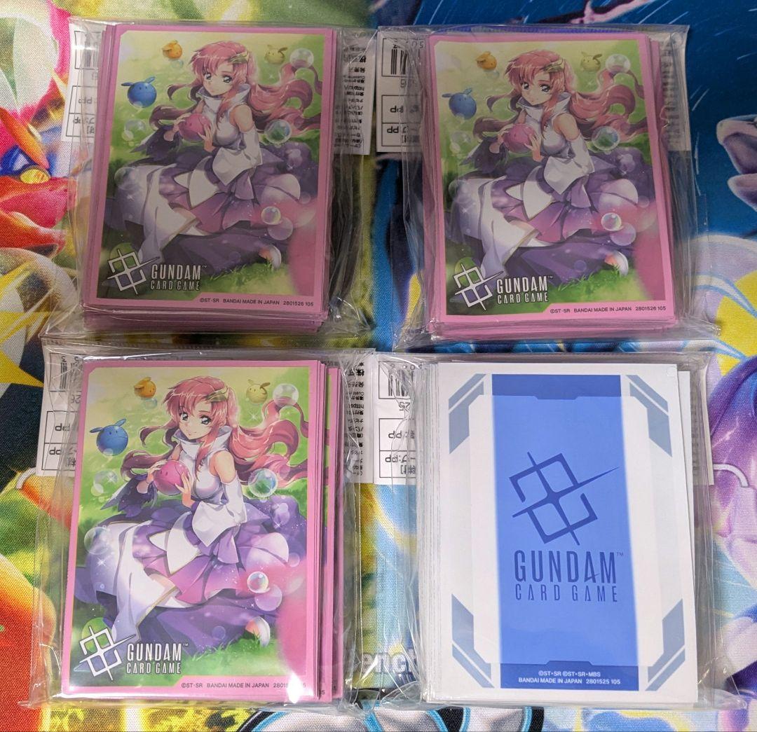 【新品・未開封】ガンダムカードゲーム スリーブ 溢れる慈愛＋ロゴ 4点セット ガンダムカードゲーム 溢れる慈愛 パラレル 未使用 傷有り ガンダム