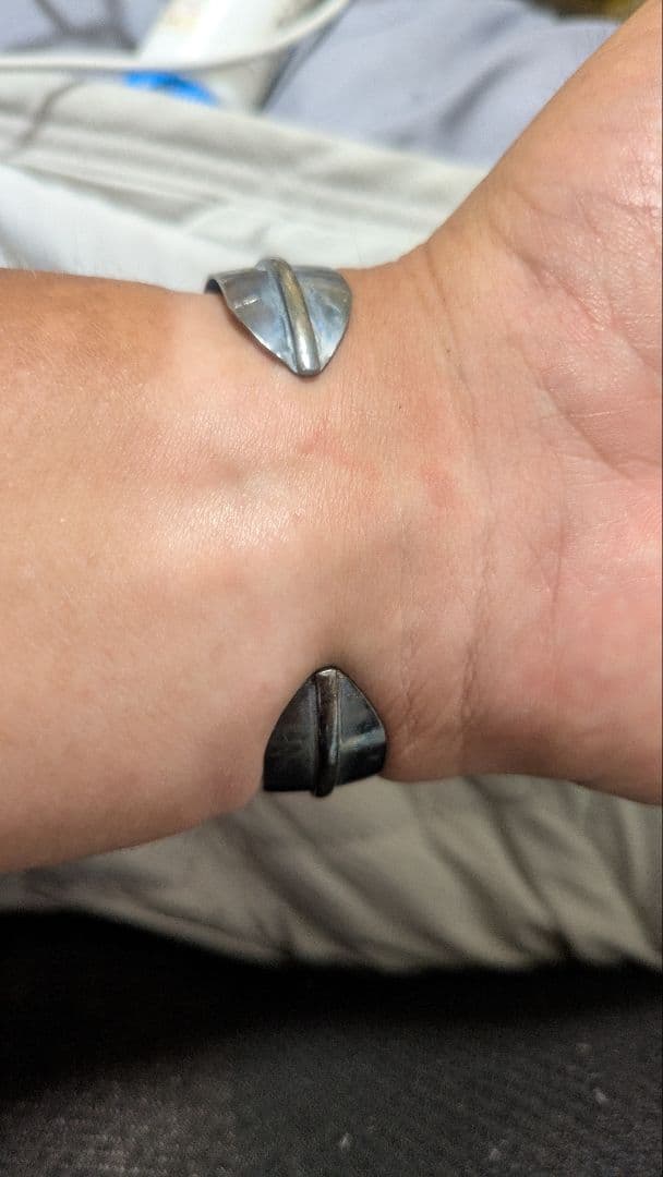 Douglas Etsittyナバホ族 フェザーシルバー インディアンジュエリー