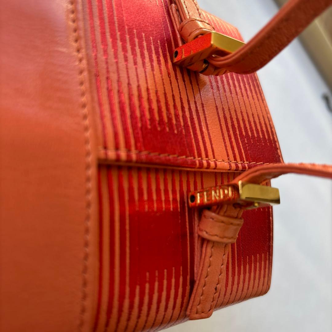 たく FENDIオレンジ ストライプ パーティーバッグ