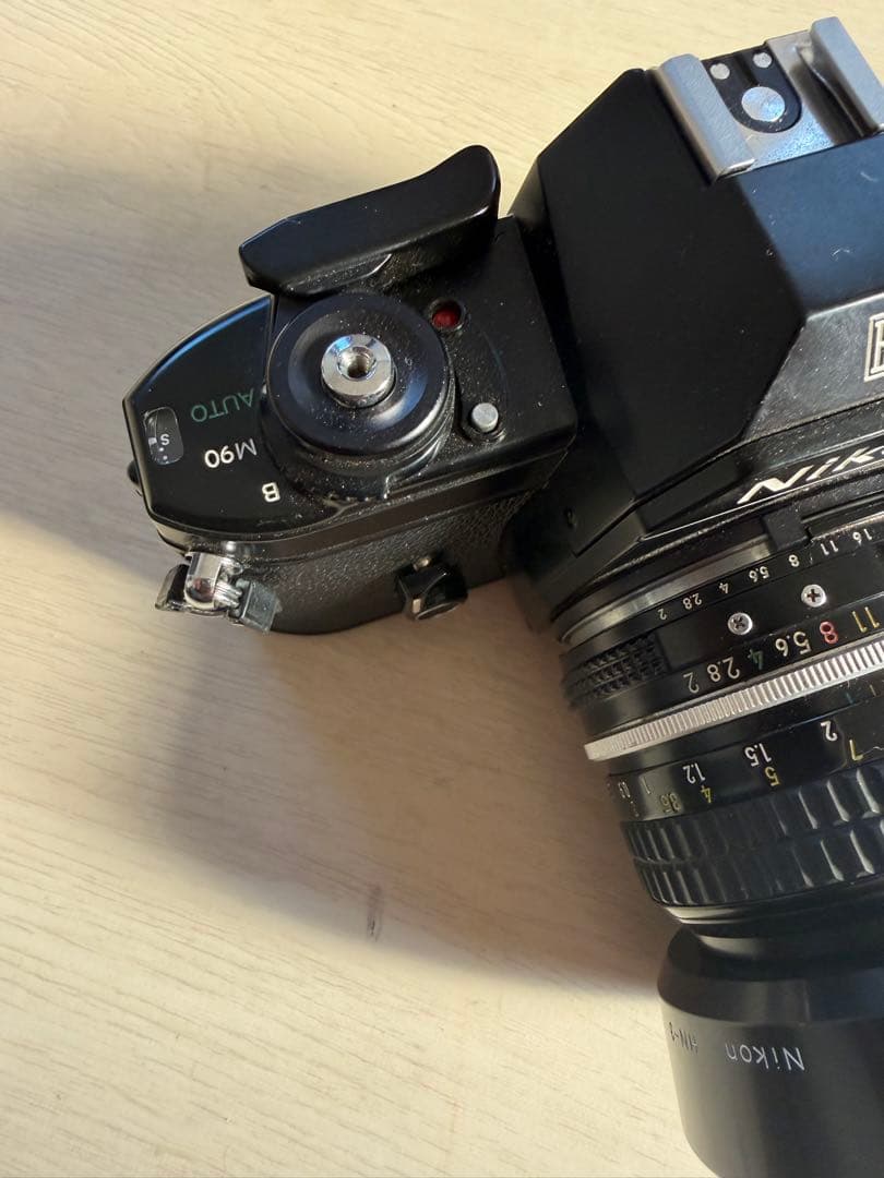 Nikon EM 一眼レフカメラ NIKKOR 50mmレンズ付き - メルカリ