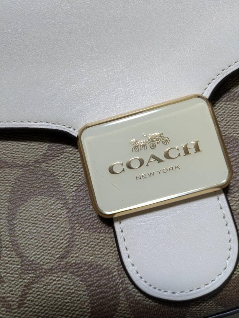 コーチ　 ショルダーバッグ　 ペッパー サッチェル シグネチャー キャンバス