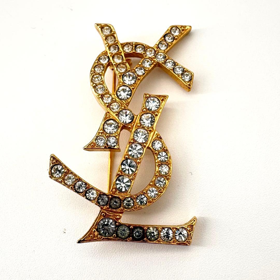 イヴサンローラン ブローチ カサンドラ YSL ロゴ ラインストーン
