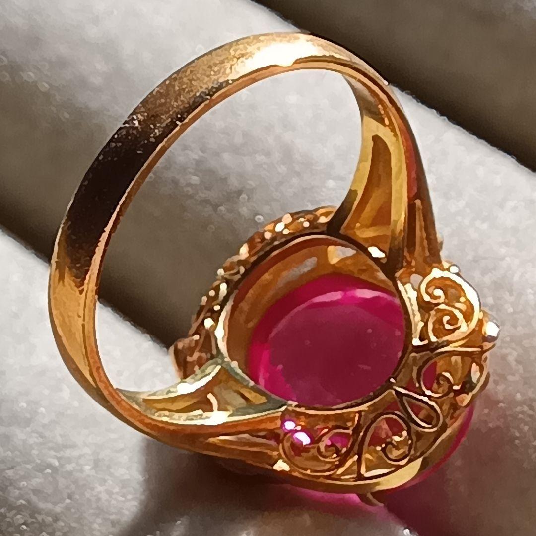 ピンク色おたからや聞くルビーかストーンリングK１８内径約１６mm重量合計４.５g