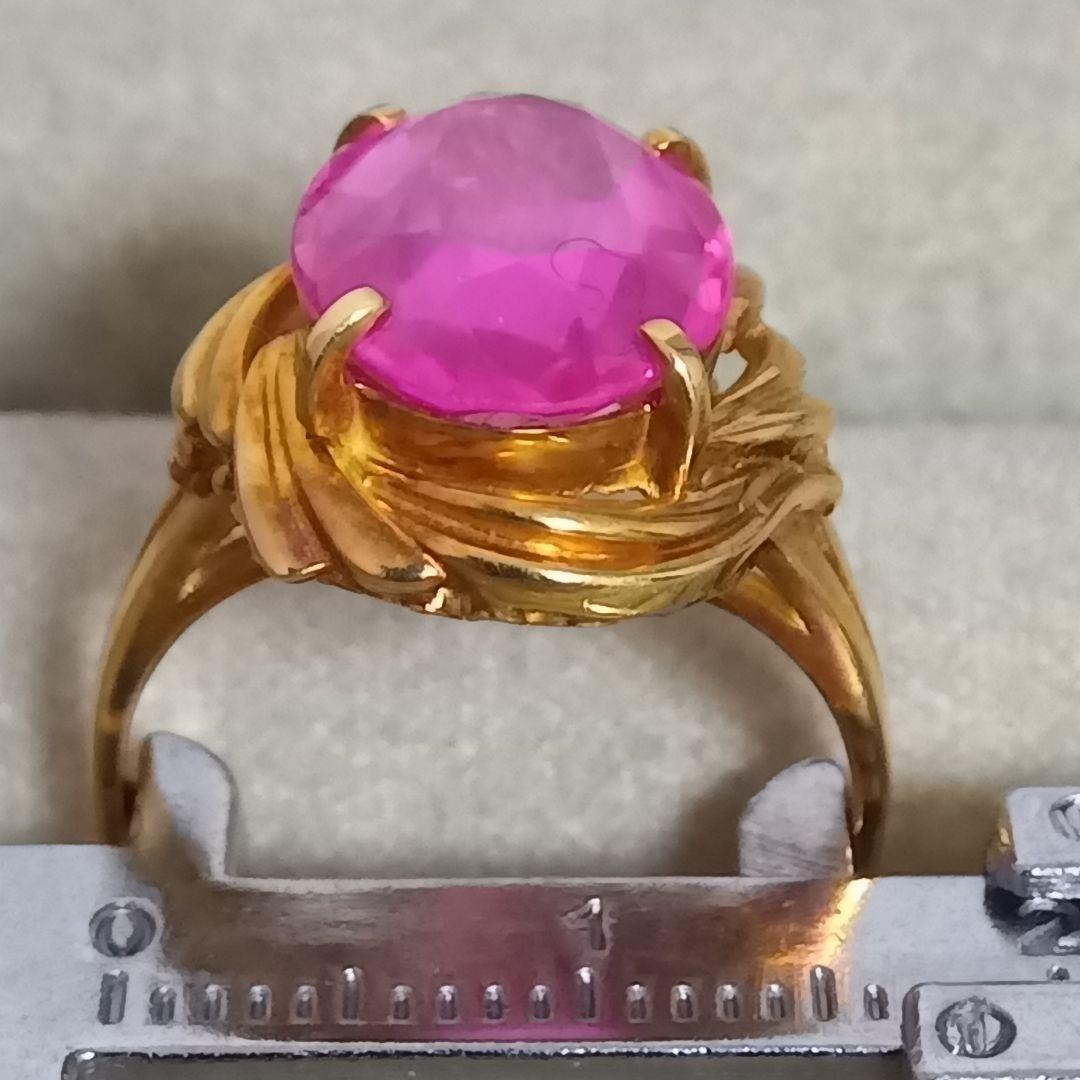 ピンク色おたからや聞くルビーかストーンリングK１８内径約１６mm重量合計４.５g