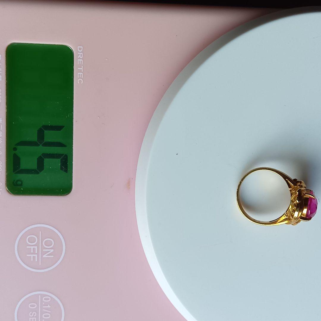 ピンク色おたからや聞くルビーかストーンリングK１８内径約１６mm重量合計４.５g