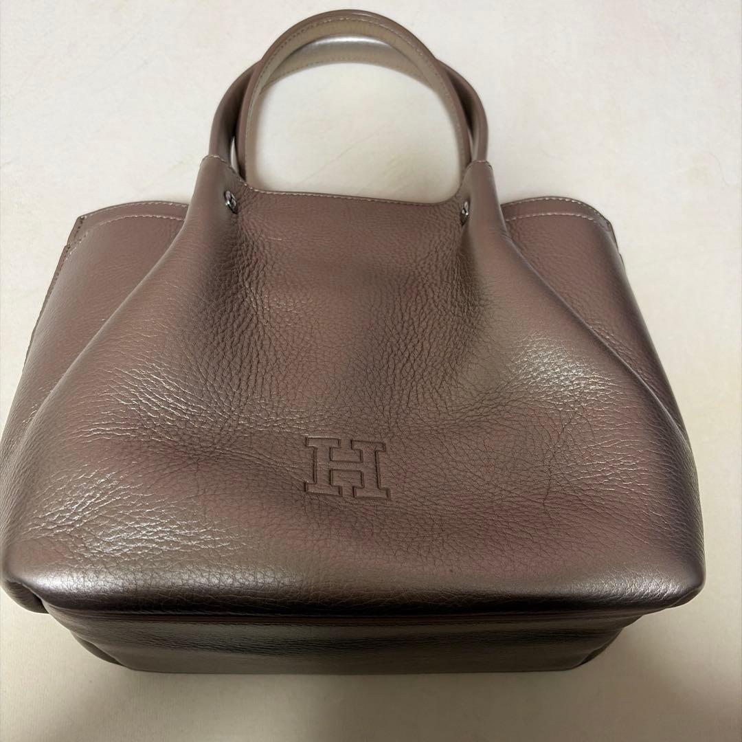 ヒロフ　メタリックゴールド レザー ハンドバッグ