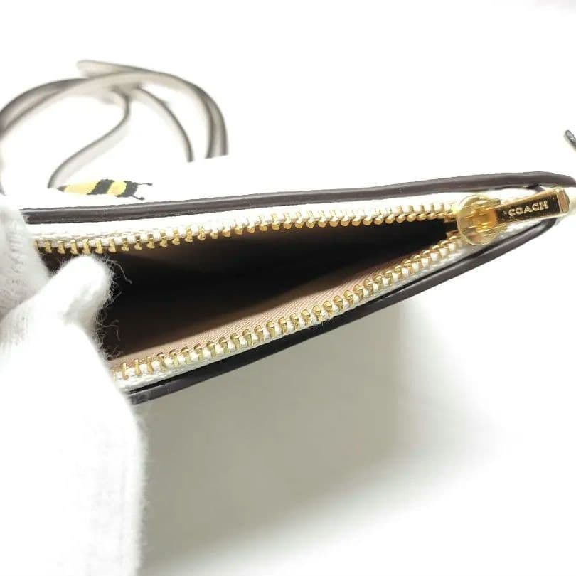 美品 COACH フォーンクロスボディ 蜂柄 スマホショルダー d27