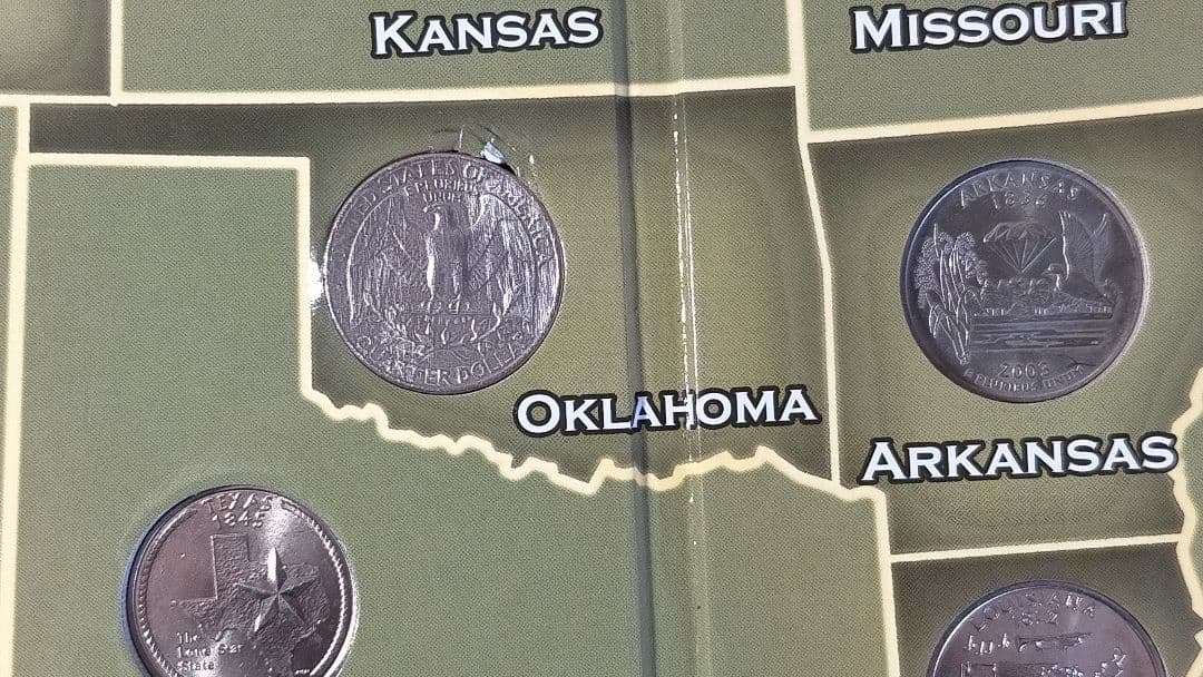 ☆。アメリカ25セントクォーター50州記念コインアルバム(コイン56枚在中)。