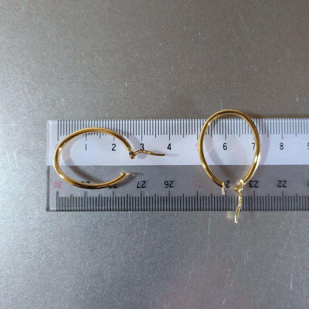 ピアス　UNOAERRE　750　YG　スナップ　ウェーブ　2.59g