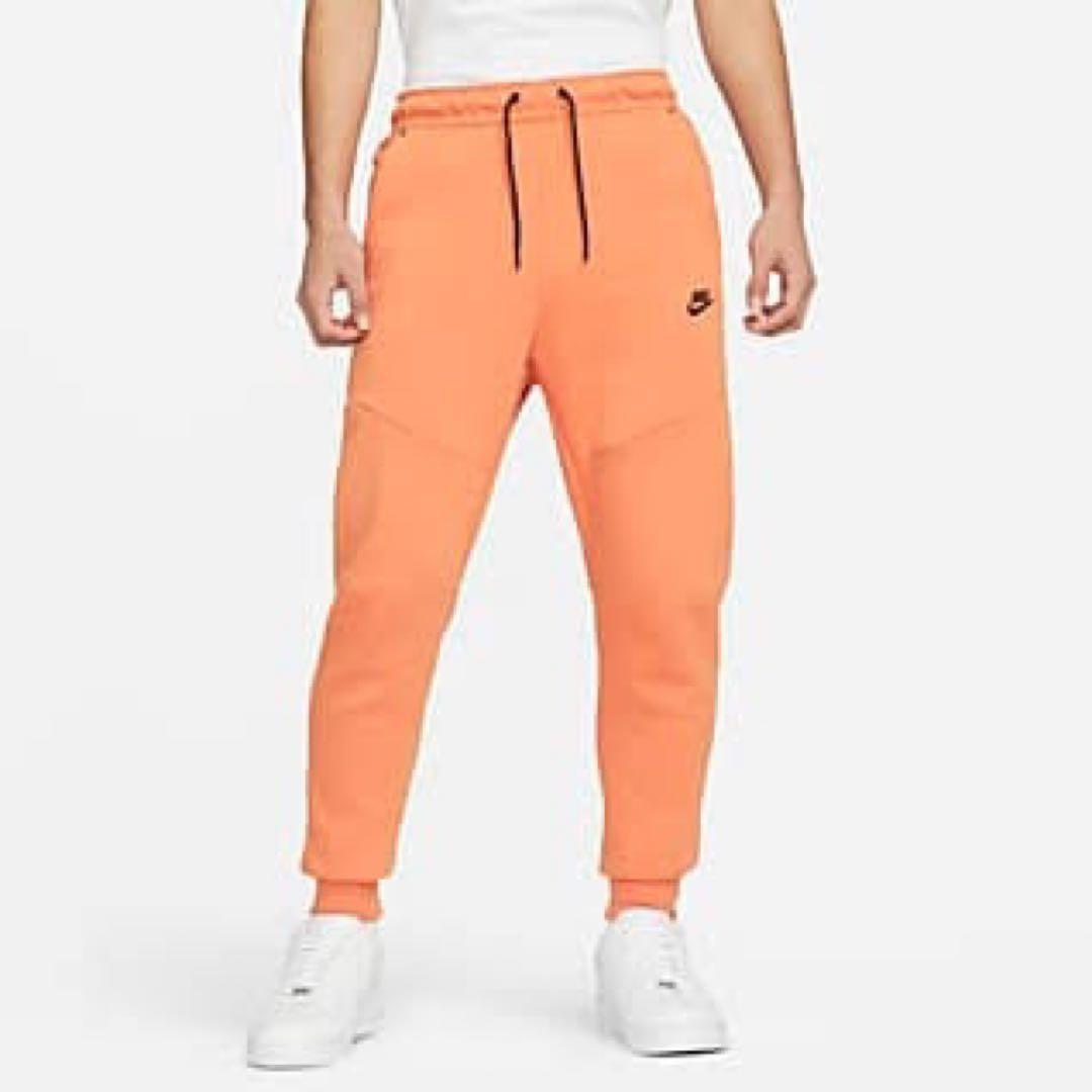 新品 NIKE ナイキ 限定カラー テックフリース ジョガーパンツ オレンジ