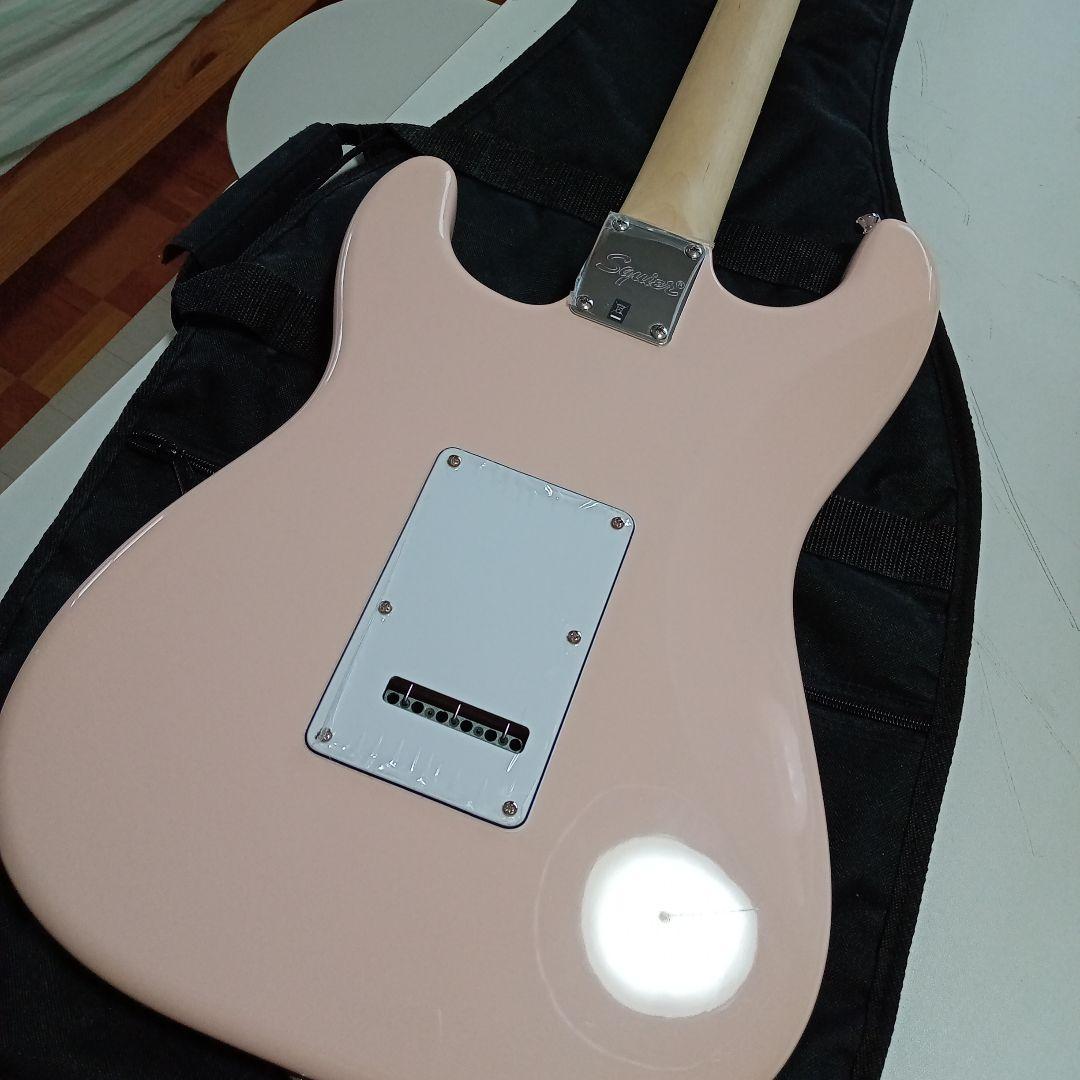 エレキギター　squier　ピンク