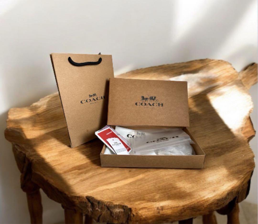 《新品》COACH 二つ折り財布