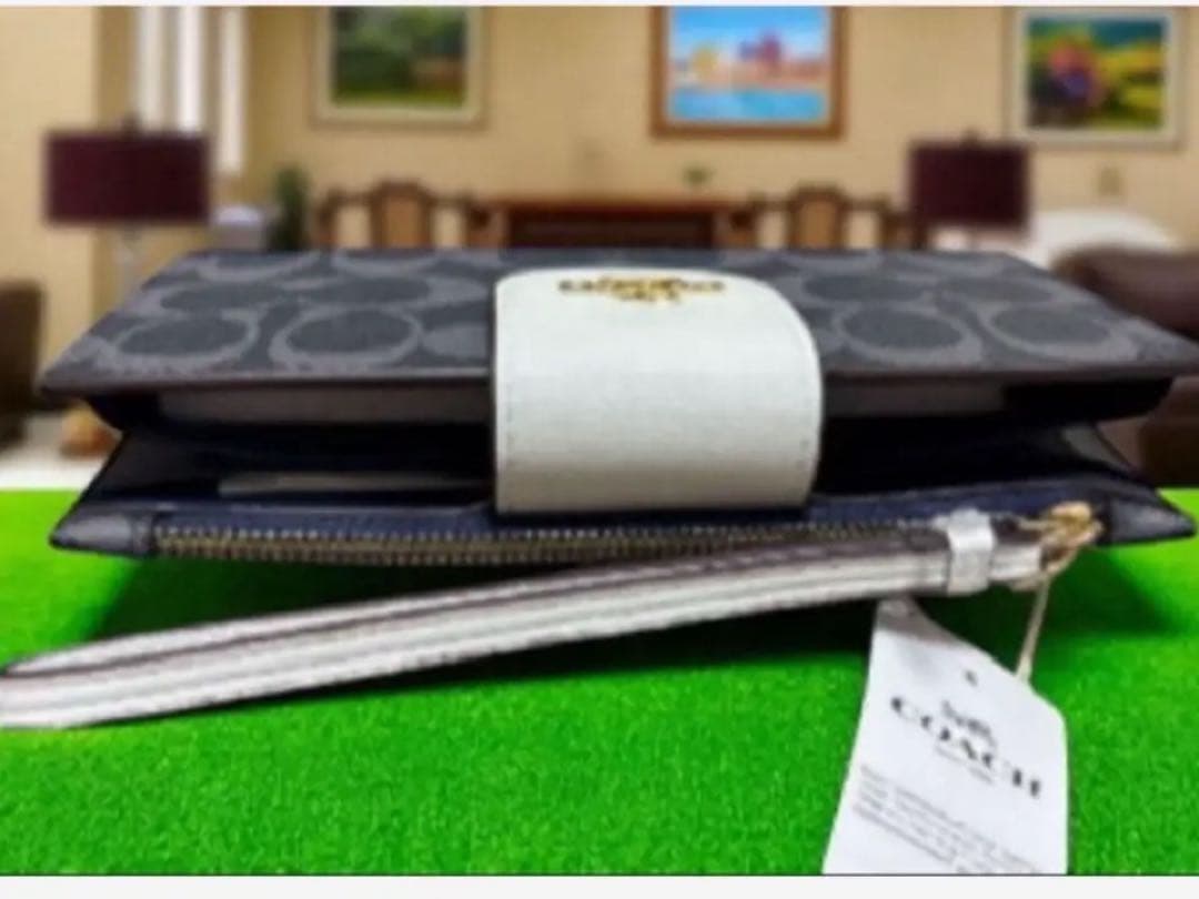 《新品》COACH 二つ折り財布