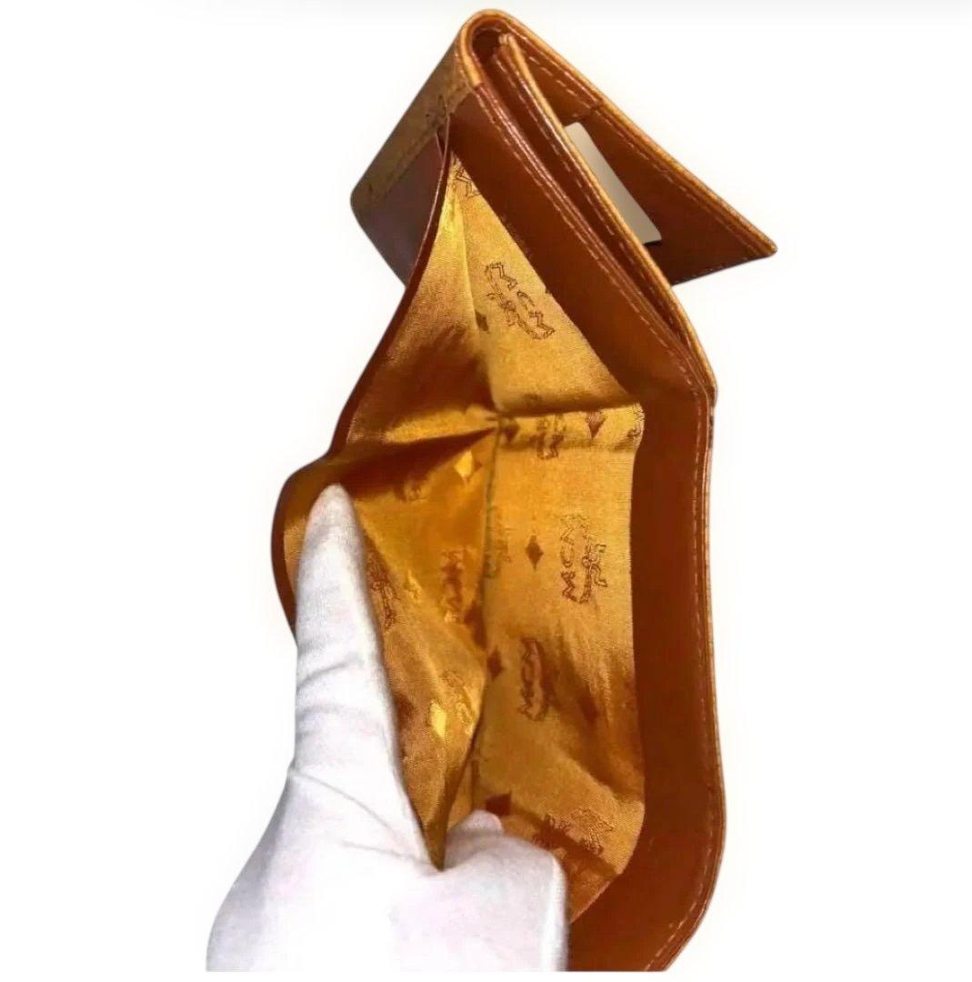 新品・未使用MCM エムシーエム 三つ折り財布 レザーブラウンロゴ入り