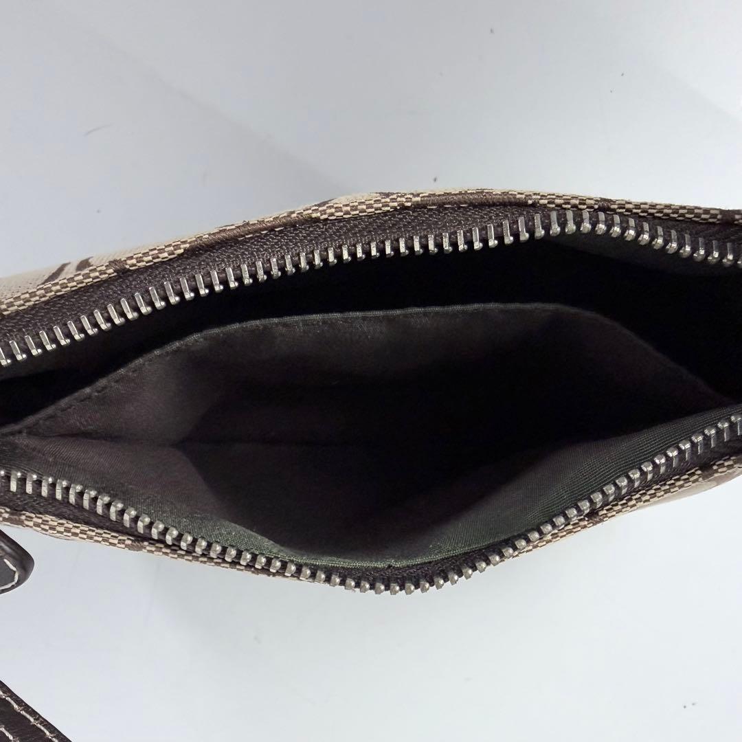 コーチ アクセサリーポーチaccessory pouch6094チャームブラウン