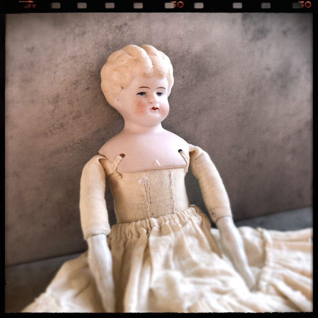 アンティークパリアンドールブロンドチャイナヘッドドール