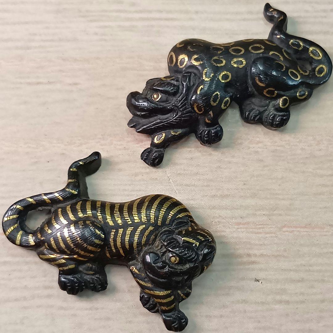 煙草入れ／雷神前金具／在銘あり