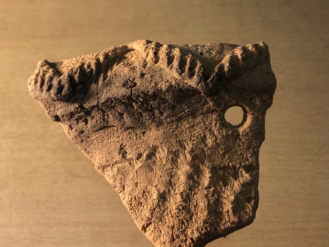 土器の欠片 縁の部分 No.660」です。