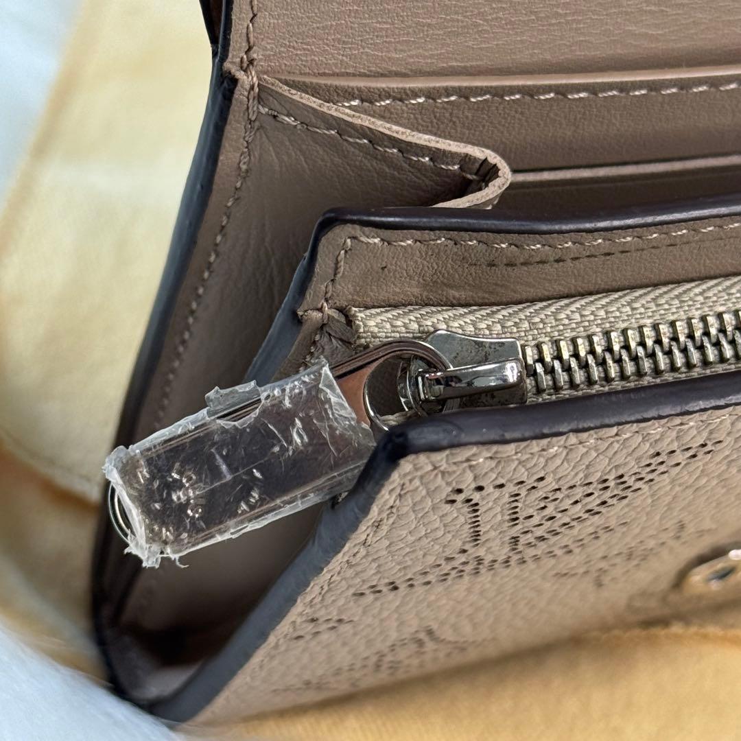 ルイヴィトン ポルトフォイユ マヒナ イリス ガレ 二つ折り財布