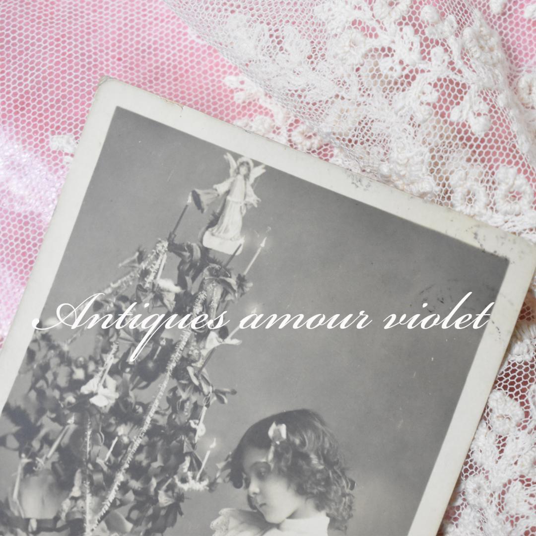 アンティークポストカード お人形と一緒のクリスマスを迎える少女