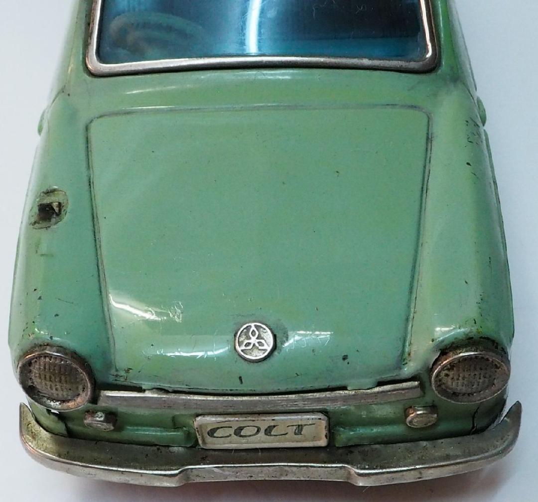 萬代屋【三菱コルト デラックス黄緑ミラー欠ホイル1個交換】フリクション ブリキ製