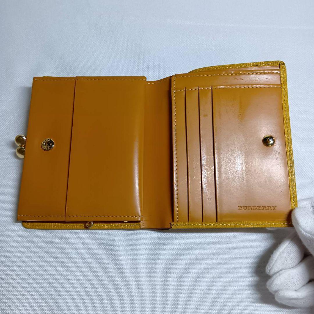 バーバリー がま口 二つ折り財布 イエロー ノバチェック - メルカリ