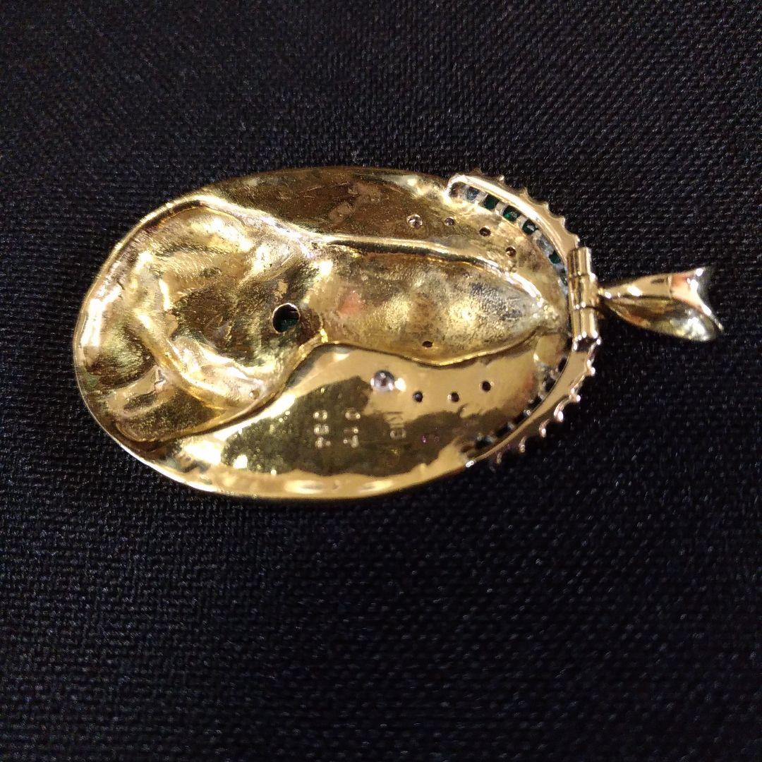 K18ペンダントトップ。菩薩像。仏様。ダイヤモンド。エメラルド。13.5g。中古