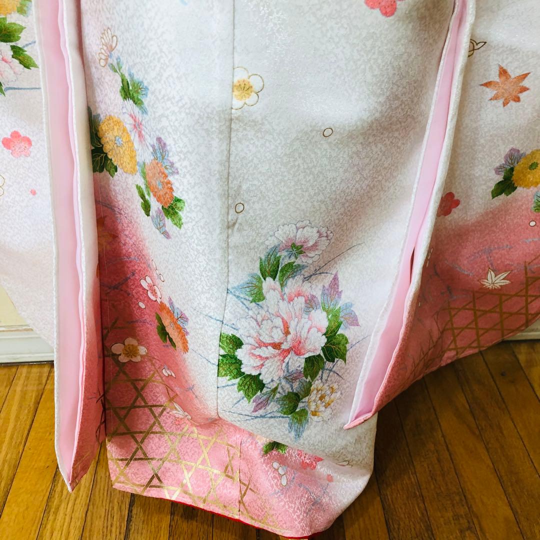 七五三七歳❣️四つ身着物未使用⭐︎白地に花々金彩煌びやか絢爛⭐︎完全フルセット銘品