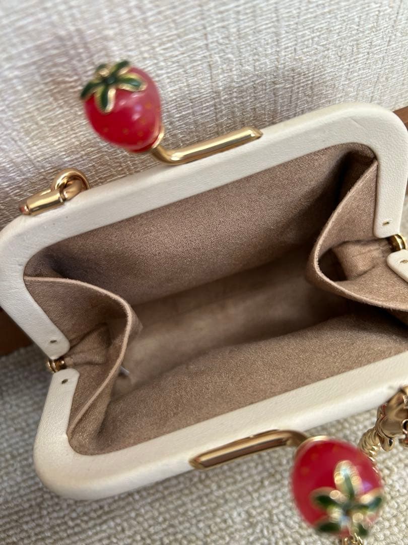 COACHコーチ 財布 がま口 ノラキスロックケース いちご