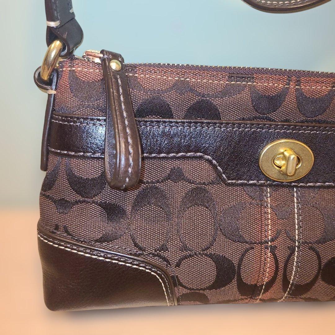 コーチ アクセサリーポーチ ワンショルダーバッグ シグネチャー ターンロック 茶