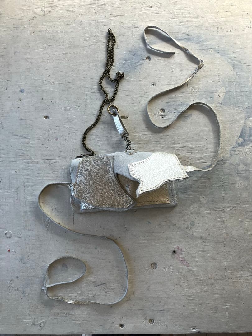 渋金革紐巻く二つ折りたたむネックウォレット＋zipperケース