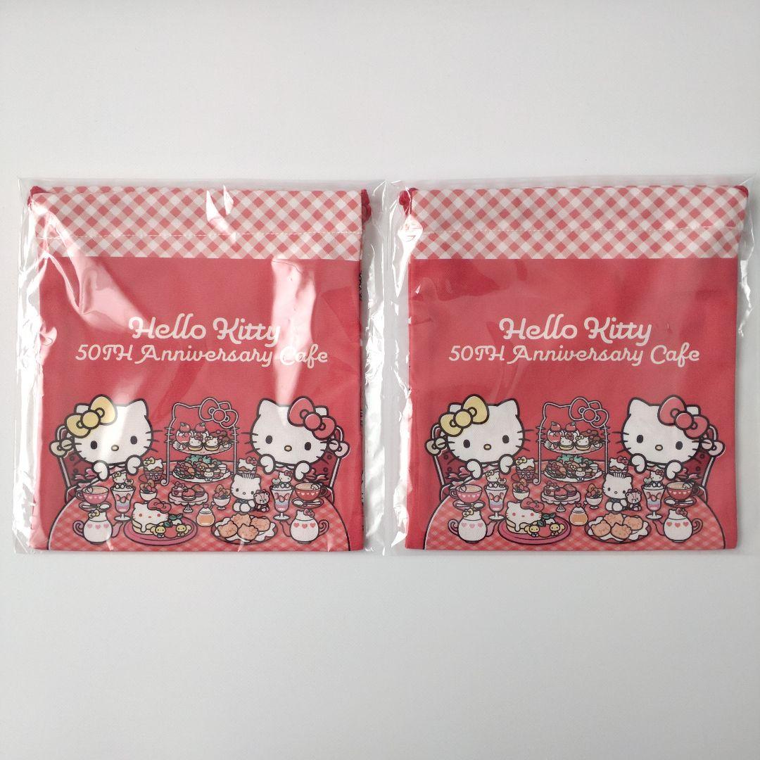 キティ 50周年記念カフェ 缶バッジ 巾着 ステッカー ショッパー