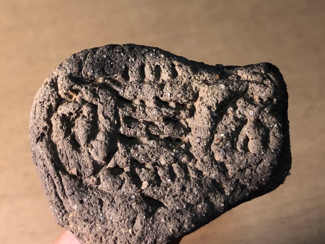 板状土偶の破片」です。