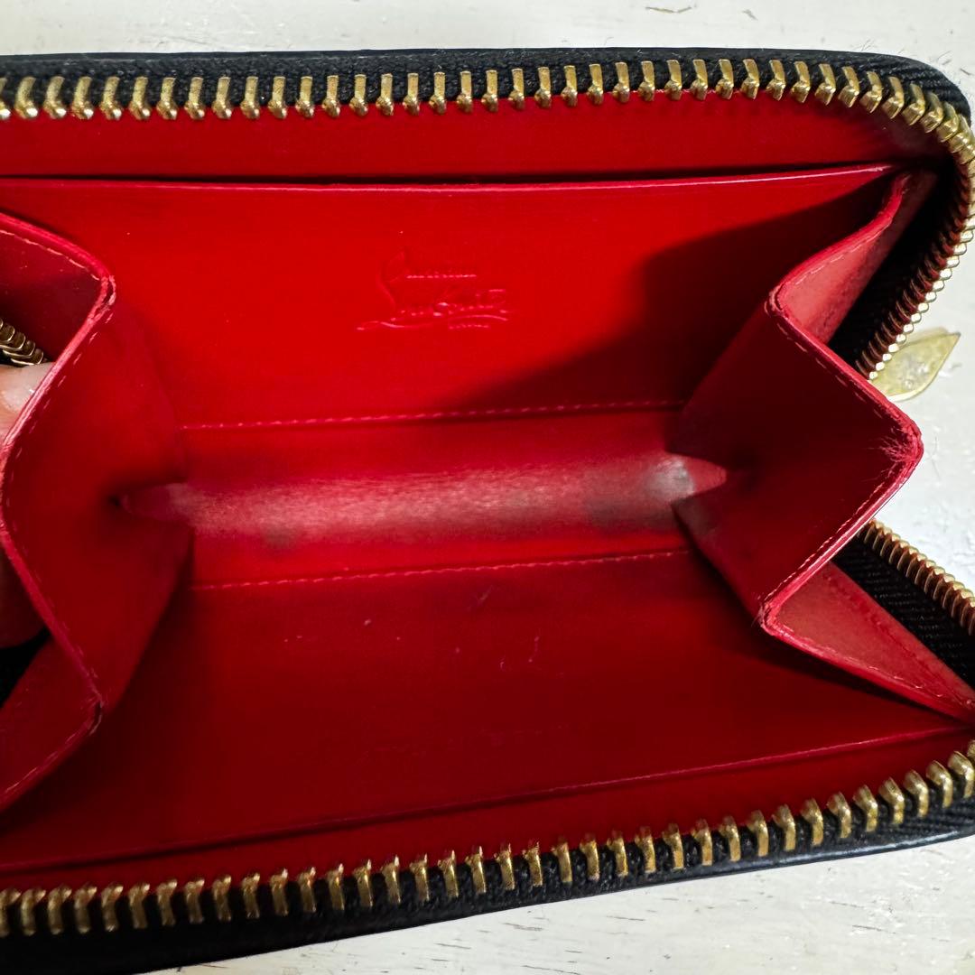 クリスチャンルブタン　スタッズ付き黒レザーケース